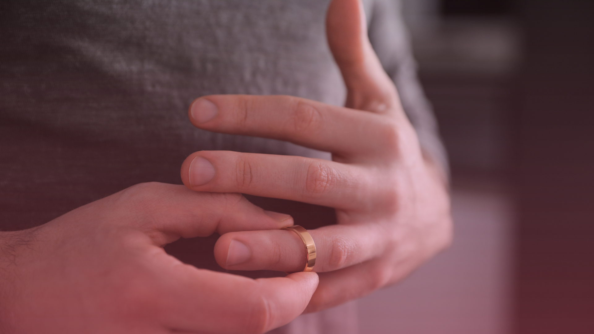 Person taking off their wedding ring after having court proceedings have gone ahead after a MIAM certificate.